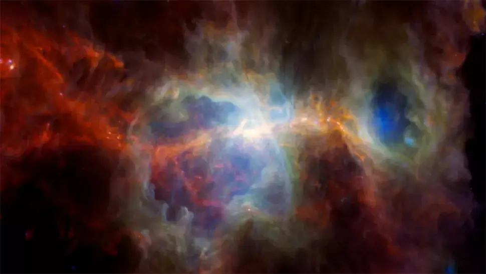 An image of the Orion Nebula as seen by the Spitzer Space Telescope and other observatories. A recent study of the nebula found new secrets of protostars 